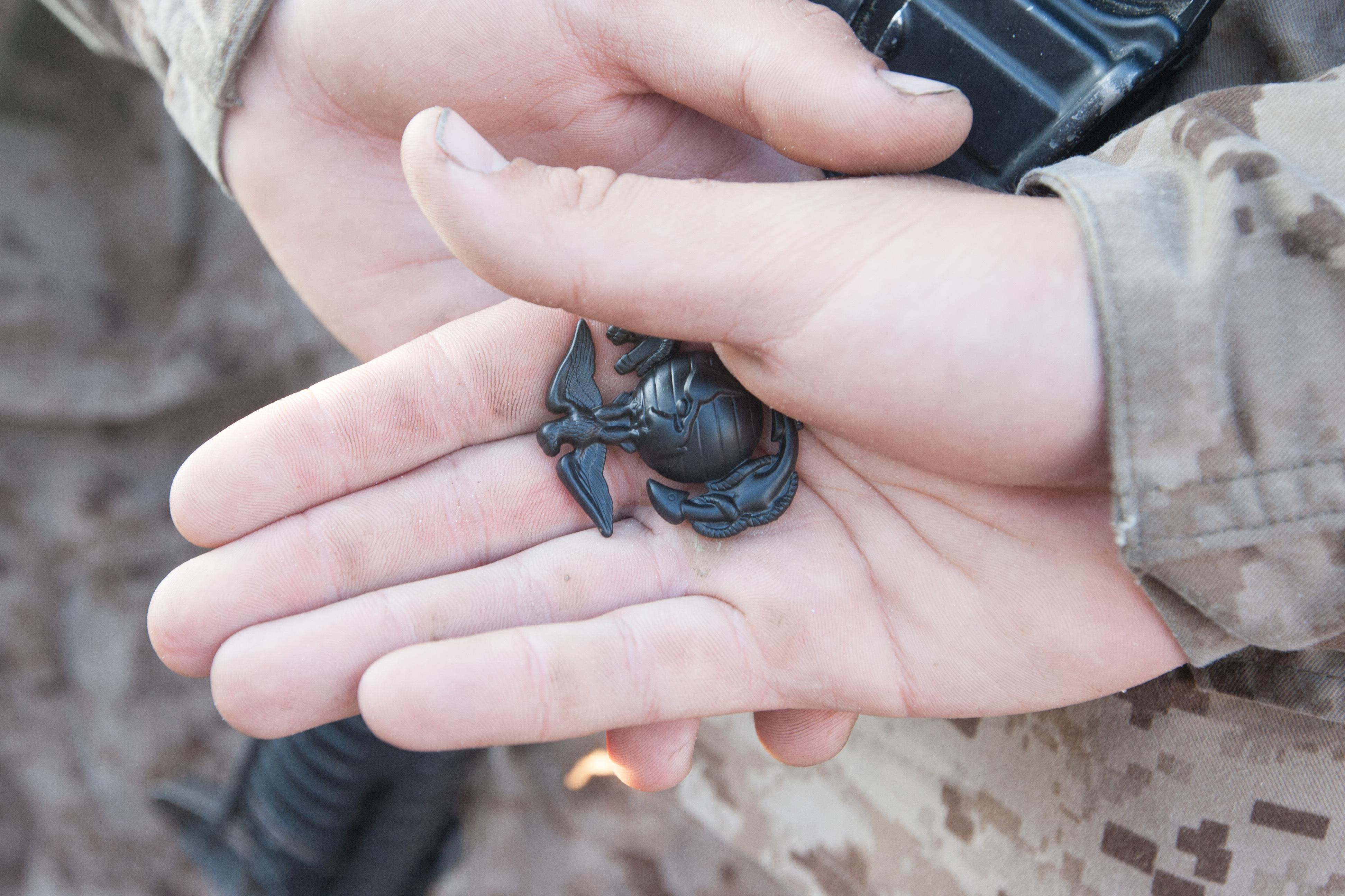 Photo Gallery: Parris Island recruits finish Crucible, earn Marine title The Eagle, Globe and Anchor has been a part of the Marine Corps uniform since 1868 and became the official emblem of the Marine Corps in 1955. This small piece of metal that only costs a few dollars is priceless to the new Marines who have endured the last 12 weeks of intense training to earn it. This ceremony has been a tradition on Parris Island since the first Crucible in 1996. Delta Company is scheduled to graduate Sept. 13, 2013. Parris Island has been the site of Marine Corps recruit training since Nov. 1, 1915. Today, approximately 20,000 recruits come to Parris Island annually for the chance to become United States Marines by enduring 13 weeks of rigorous, transformative training. Parris Island is home to entry-level enlisted training for 50 percent of males and 100 percent for females in the Marine Corps. (Photo by Lance Cpl. MaryAnn Hill)